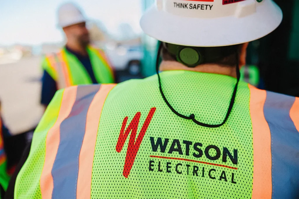 watson employee in safety vest and hard hat