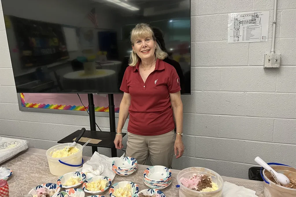 susan with table of ice cream for teacher appreciation