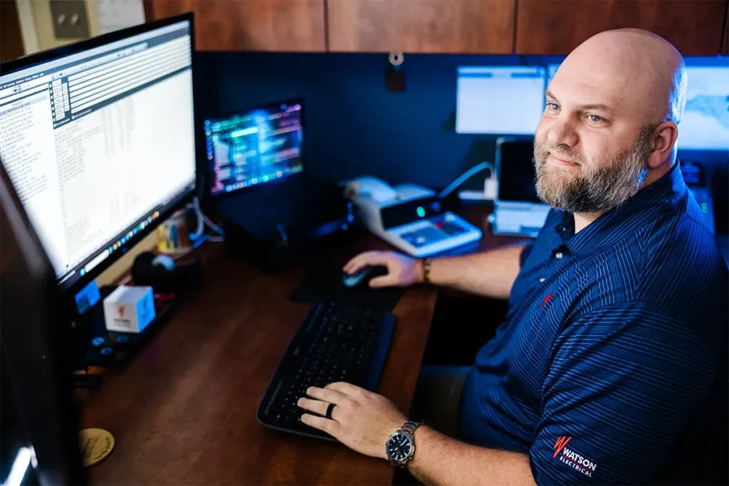 estimator at Watson working on computer